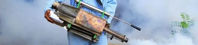Fumigation technician using a fogger for deep pest treatment in Memphis, TN